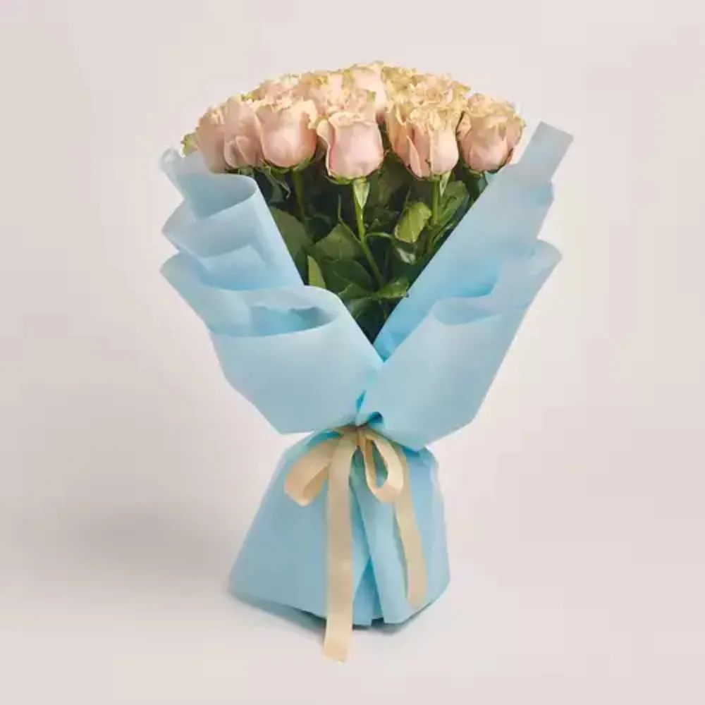 Fresh pink roses bouquet wrapped in elegant pastel paper with premium finishing and soft ribbon, perfect for romantic gifting, anniversaries, and same-day flower delivery in Dubai.