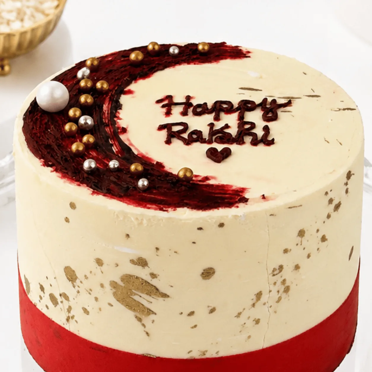 Two-portion red velvet Rakhi cake with Happy Rakhi chocolate message
