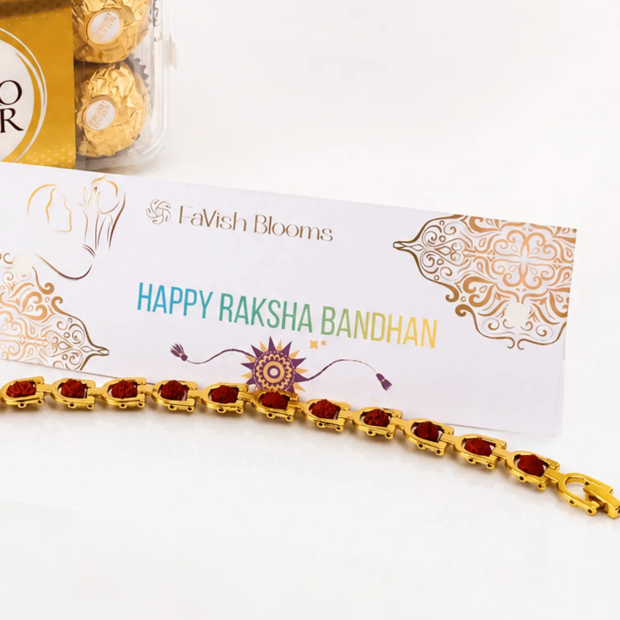 Premium Ferrero Rocher chocolates with elegant golden bracelet Rakhi by FaVish Blooms UAE