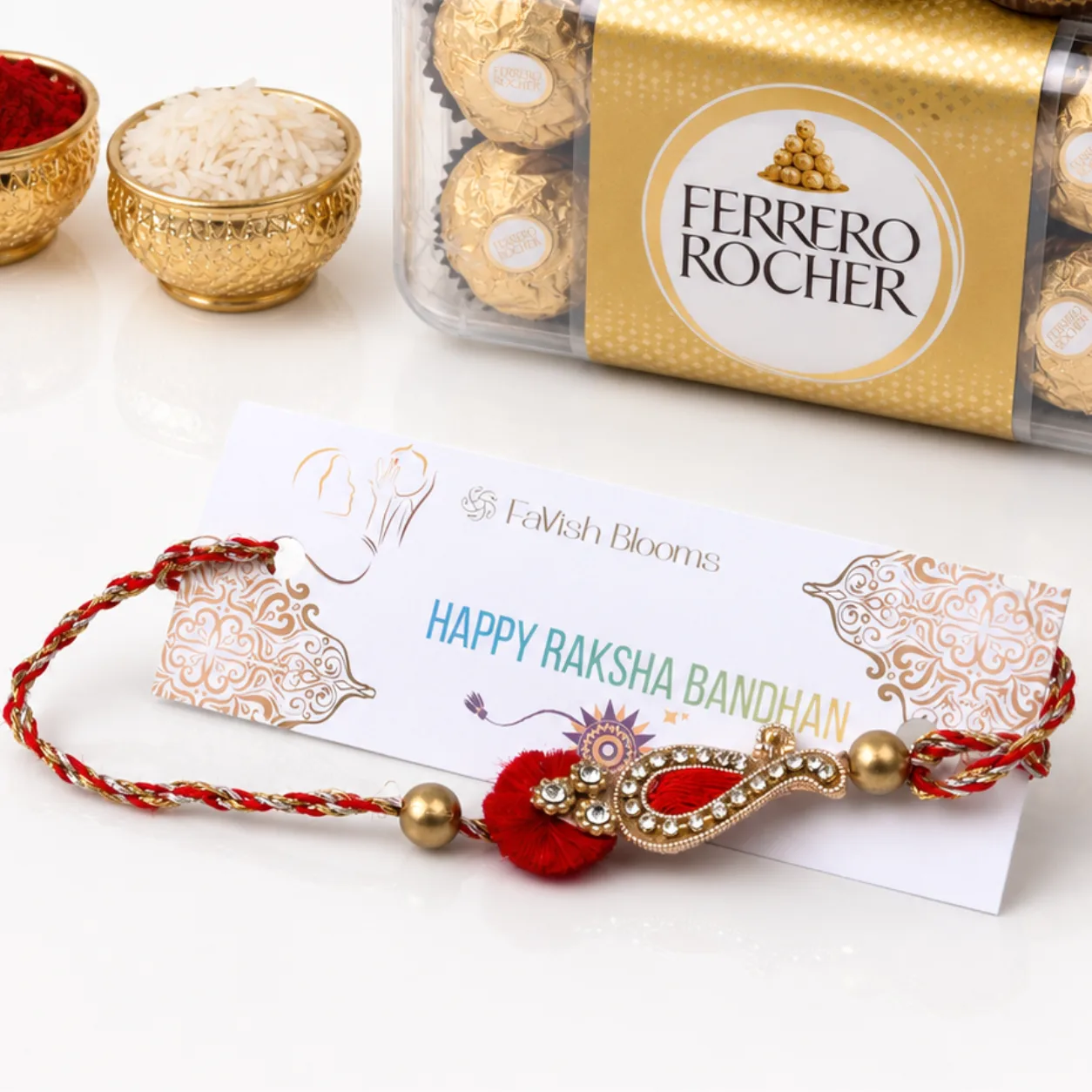 Raksha Bandhan gift set featuring Paisley Design Rakhi and Ferrero Rocher box