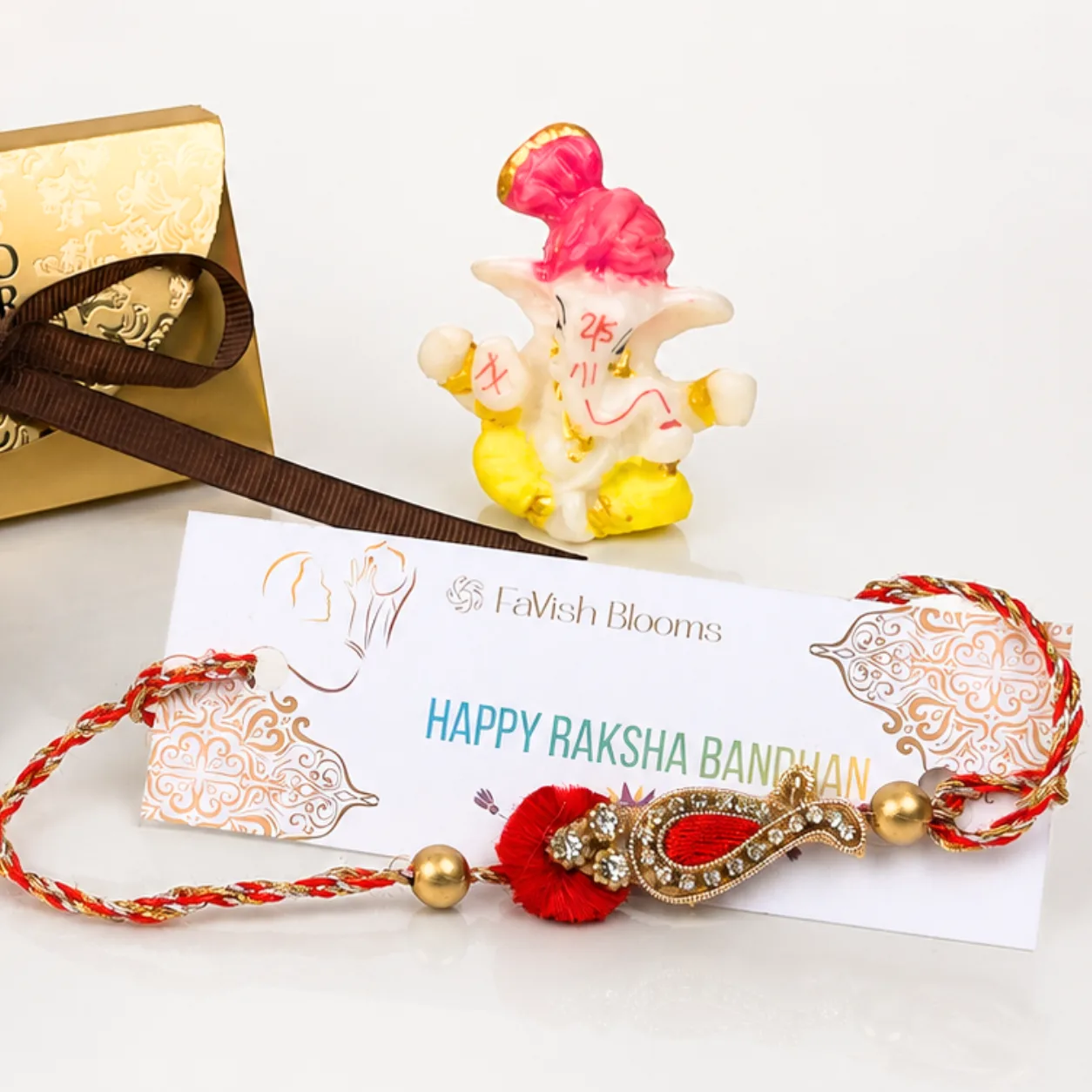 Raksha Bandhan Paisley Rakhi hamper with chocolates, Ganesha idol, roli and chawal