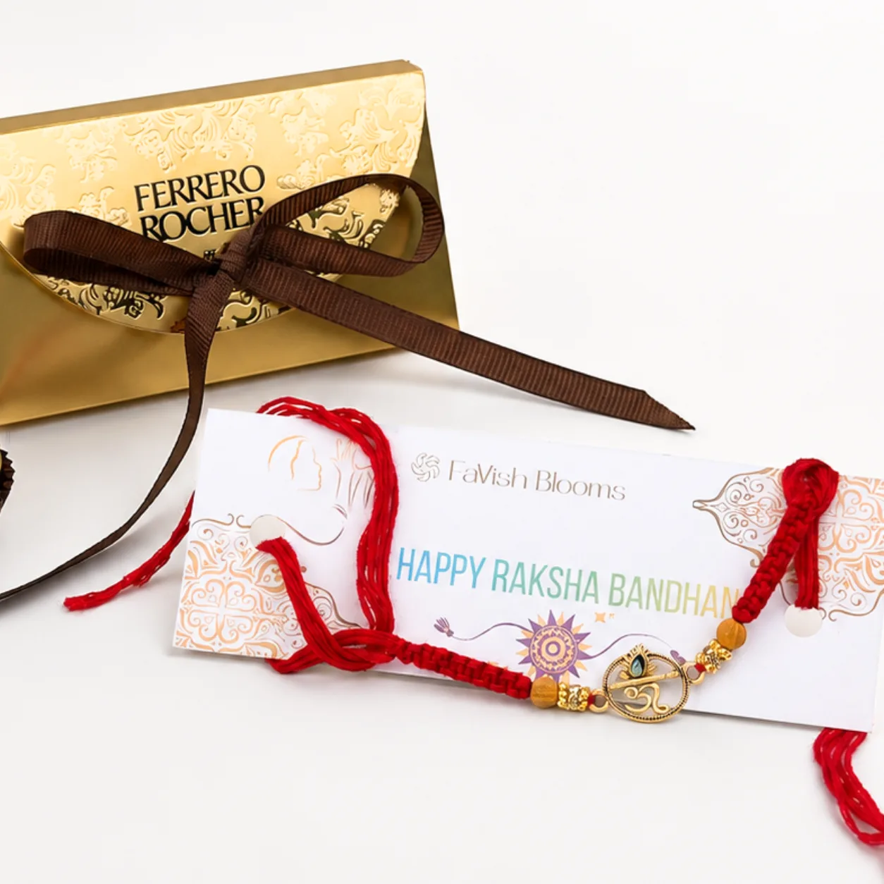 Traditional Om design Rakhi paired with premium Ferrero Rocher chocolates