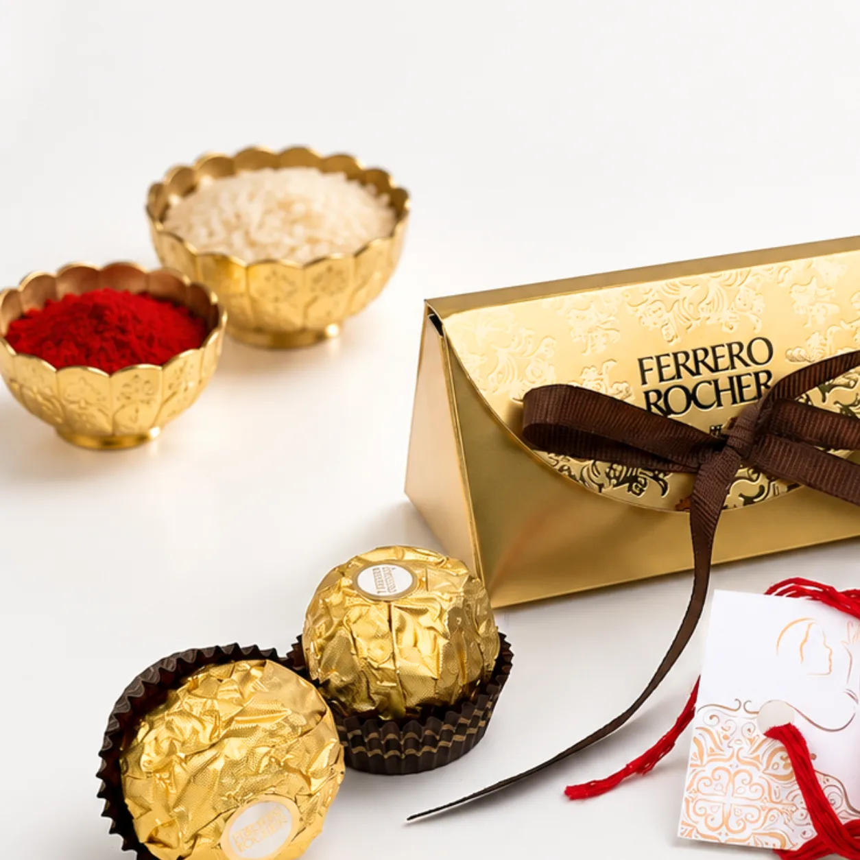 Golden Om Rakhi and Ferrero Rocher chocolate gift for Raksha Bandhan