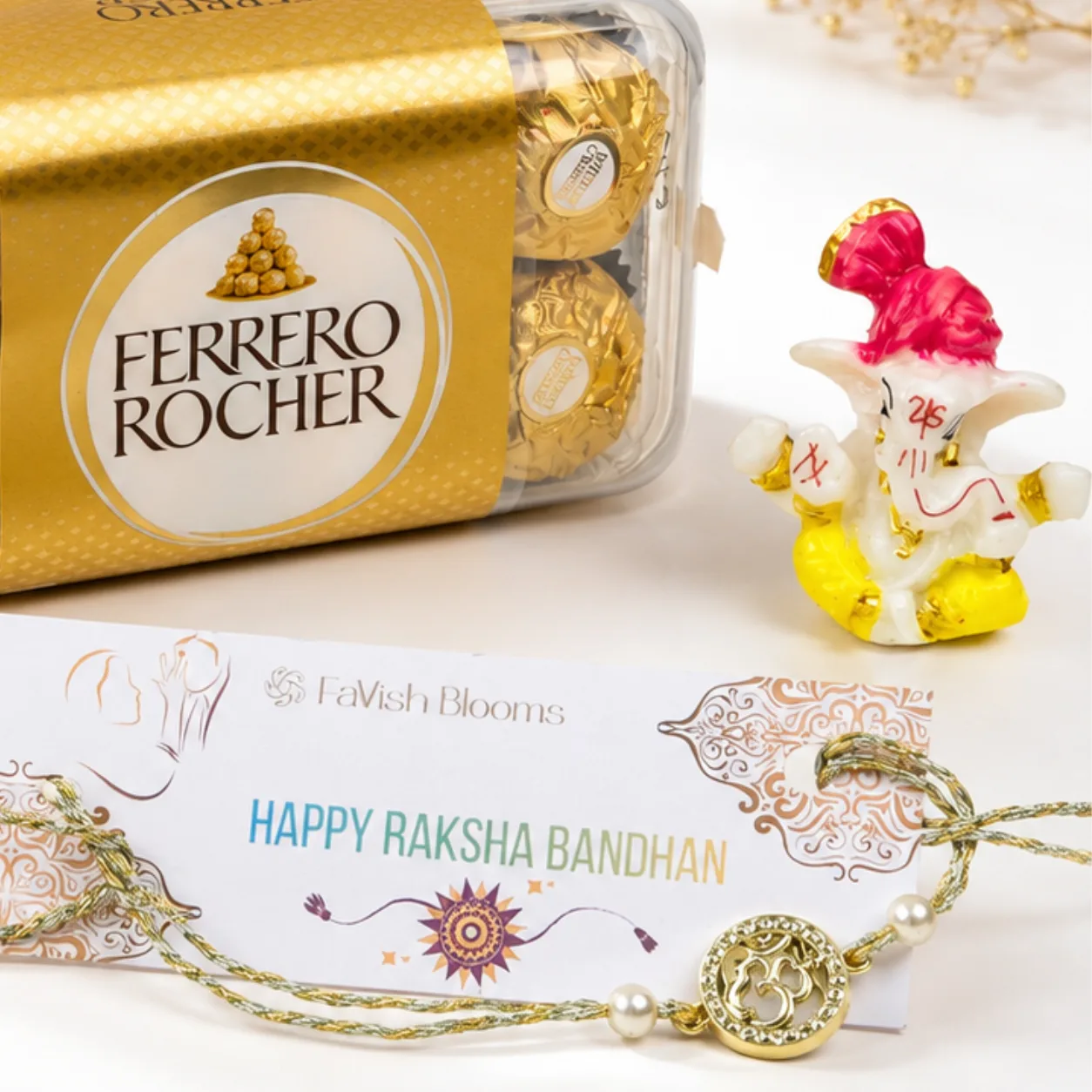 Close-up of golden Om Rakhi featuring elegant beads and festive detailing.