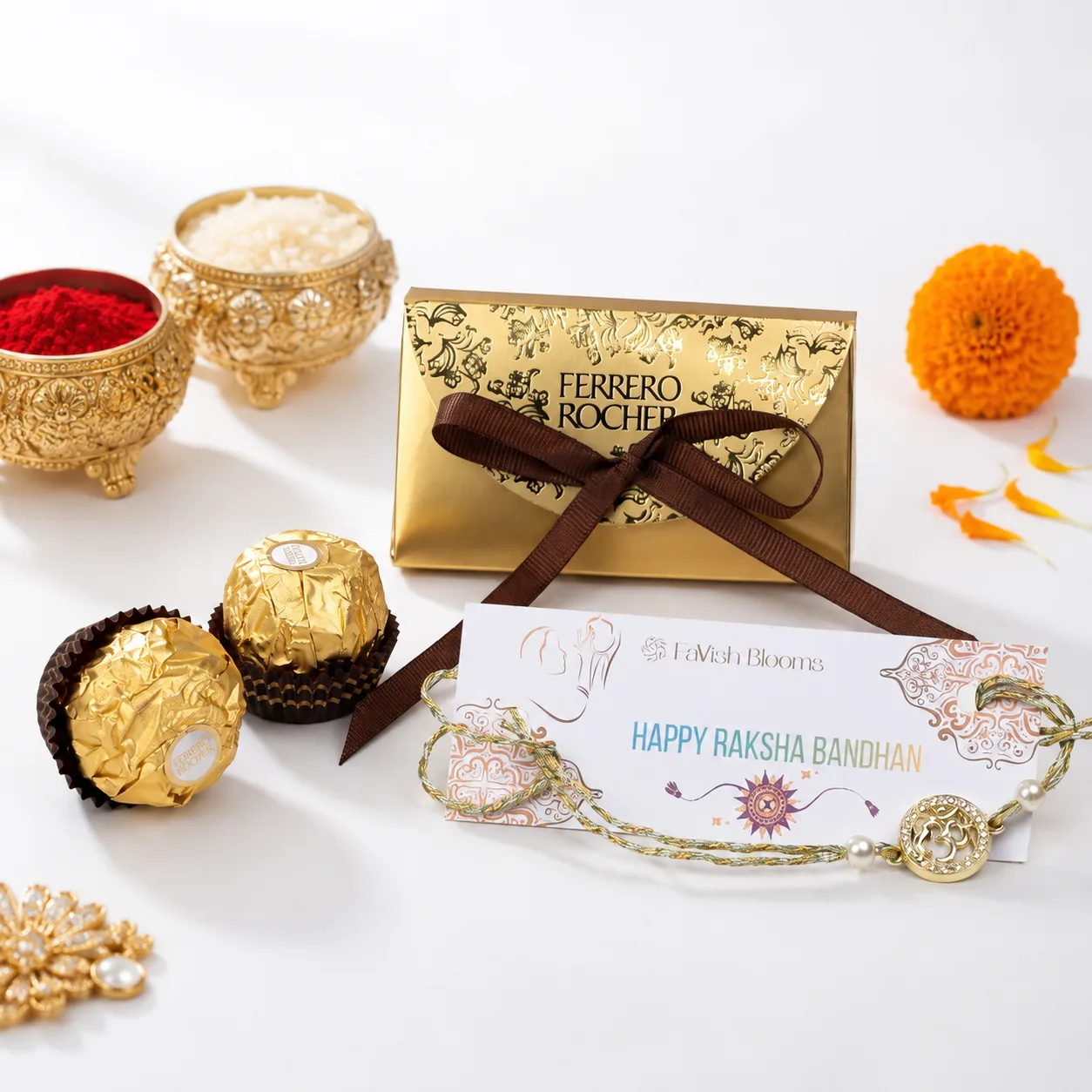 Premium Om Rakhi Ferrero Treats gift set featuring chocolates, festive accessories, roli, chawal, and a greeting card.