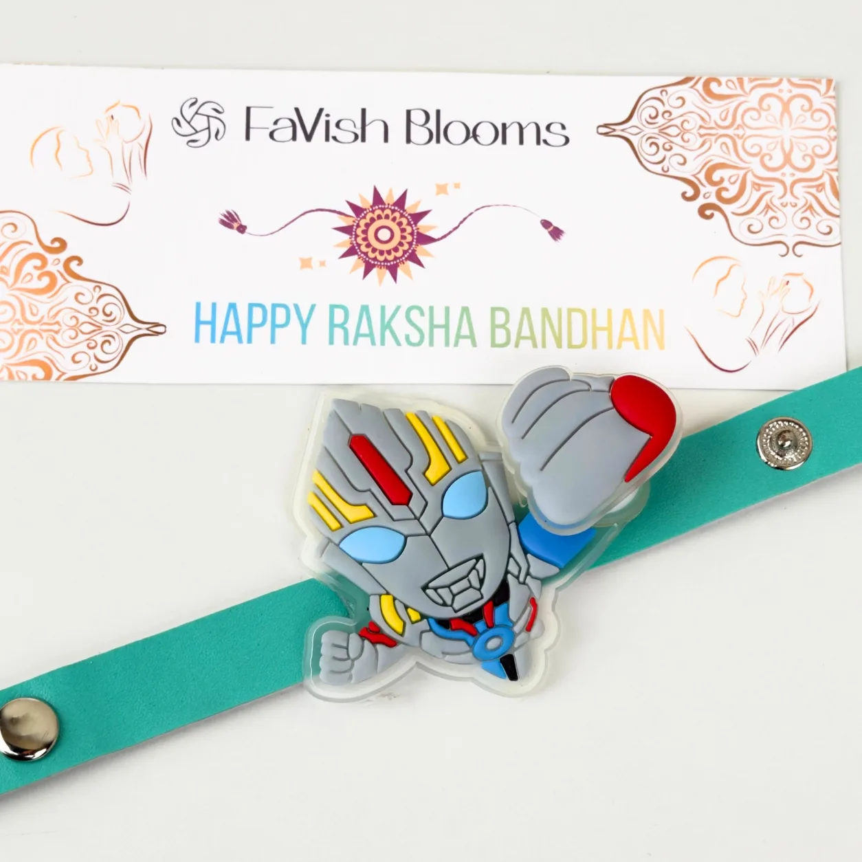Close-up of Superhero and Doraemon spinner rakhis for kids