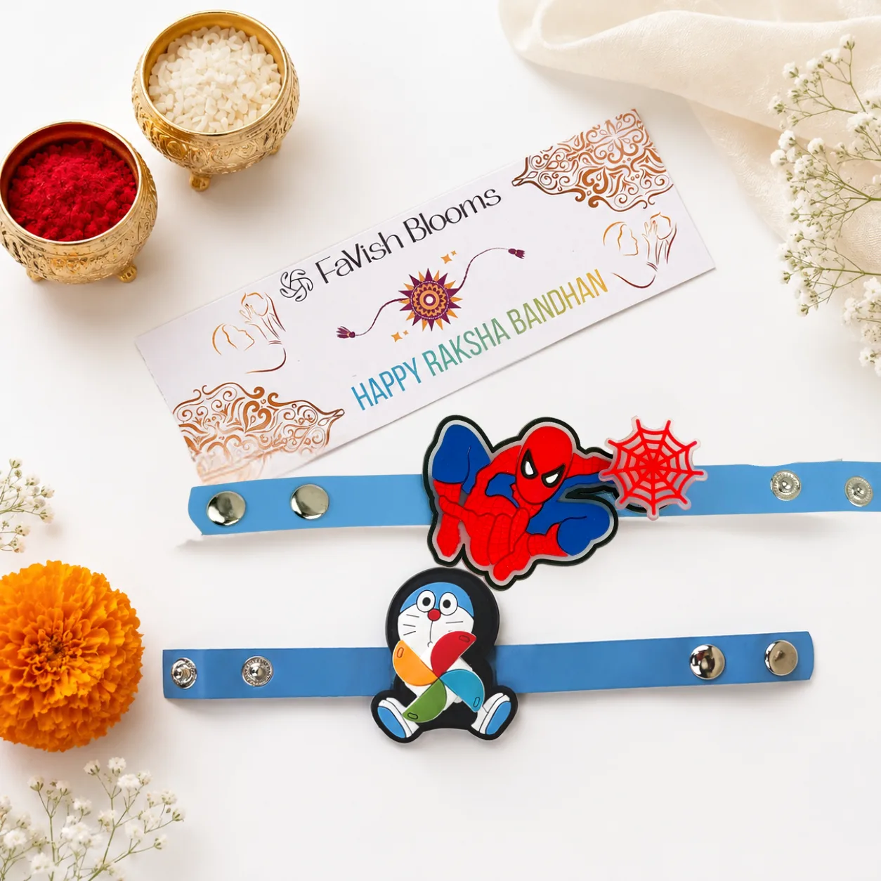 Spider-Man and Doraemon spinner kids Rakhi set with colourful braided threads and decorative beads.