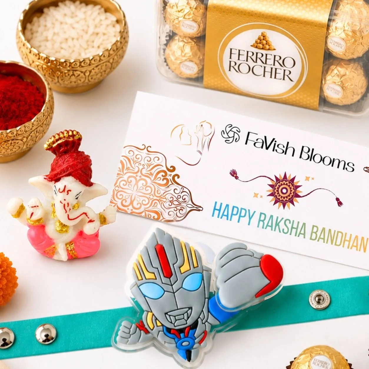 Superhero Rakhi gift combo featuring Ferrero Rocher chocolates, greeting card, roli and chawal.