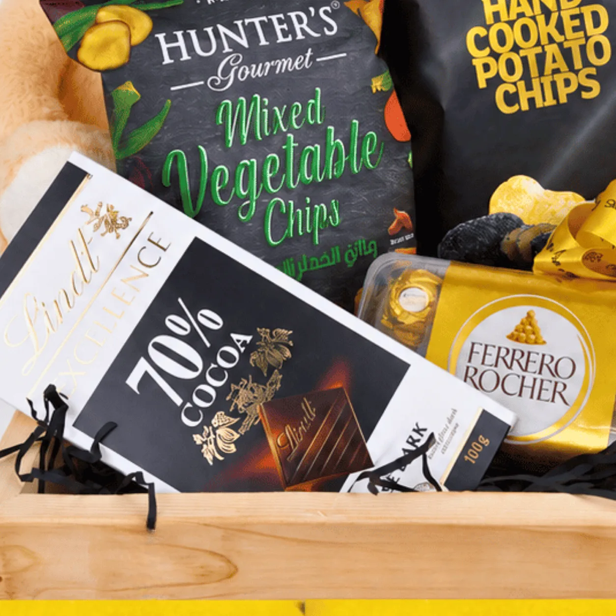 Luxury chocolate and gourmet chips gift hamper with premium sweets, savory snacks and teddy bear