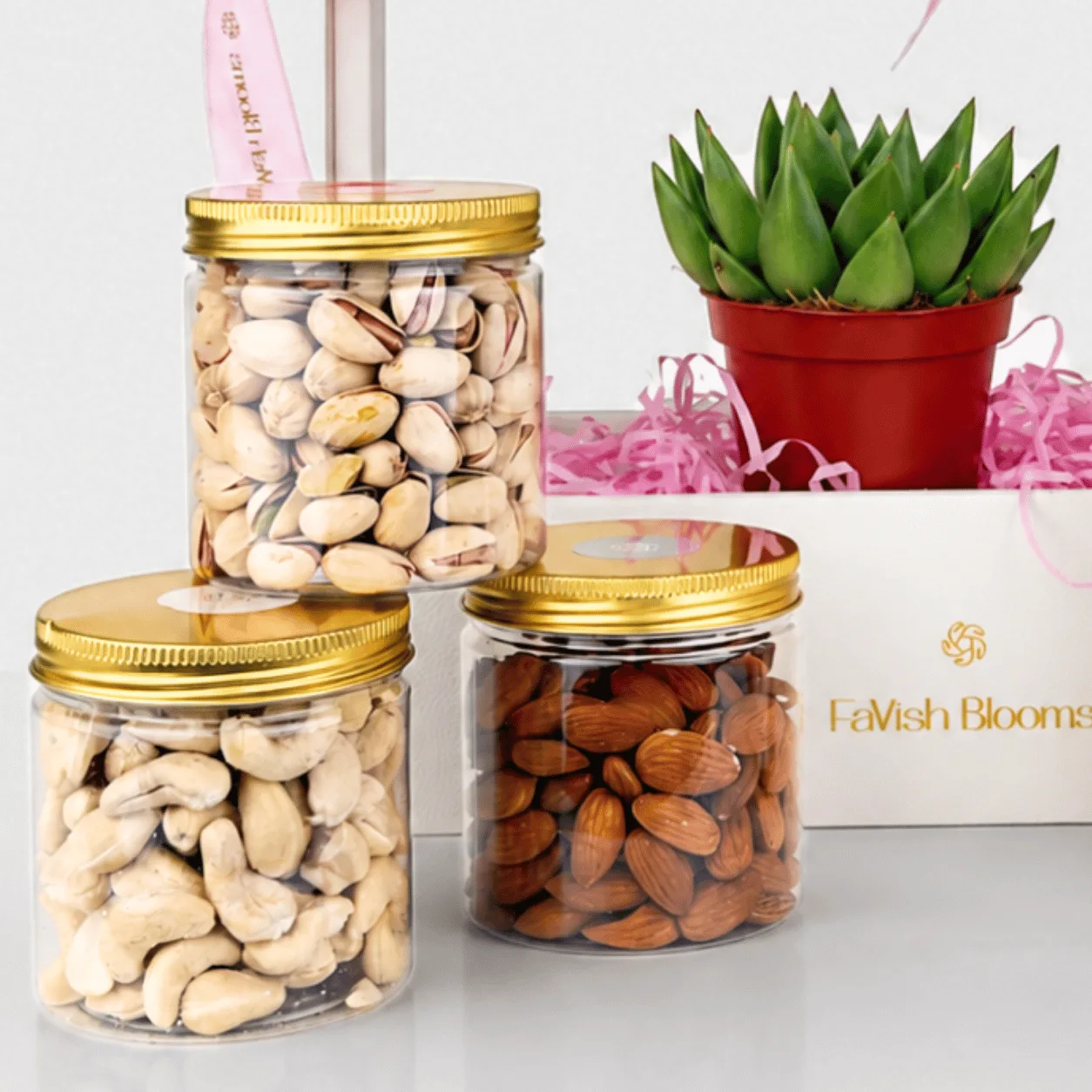 Luxury gift hamper featuring premium dry fruits, Godiva chocolates and elegant packaging