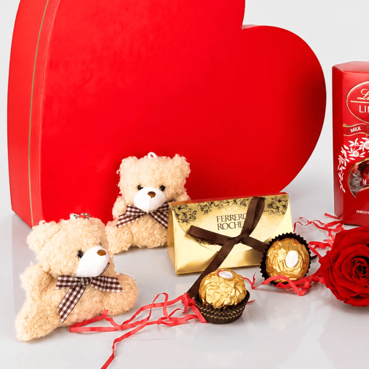 Romantic heart-shaped chocolate gift box with teddy bear for birthdays and special occasions