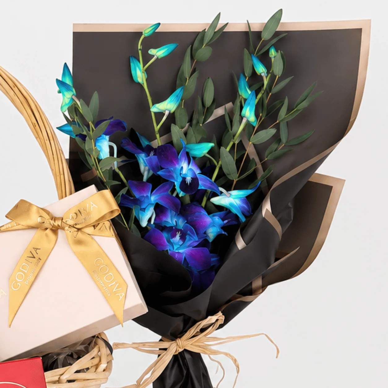 Premium Godiva and Lindt Chocolate Gift Basket with fresh flowers for special occasions