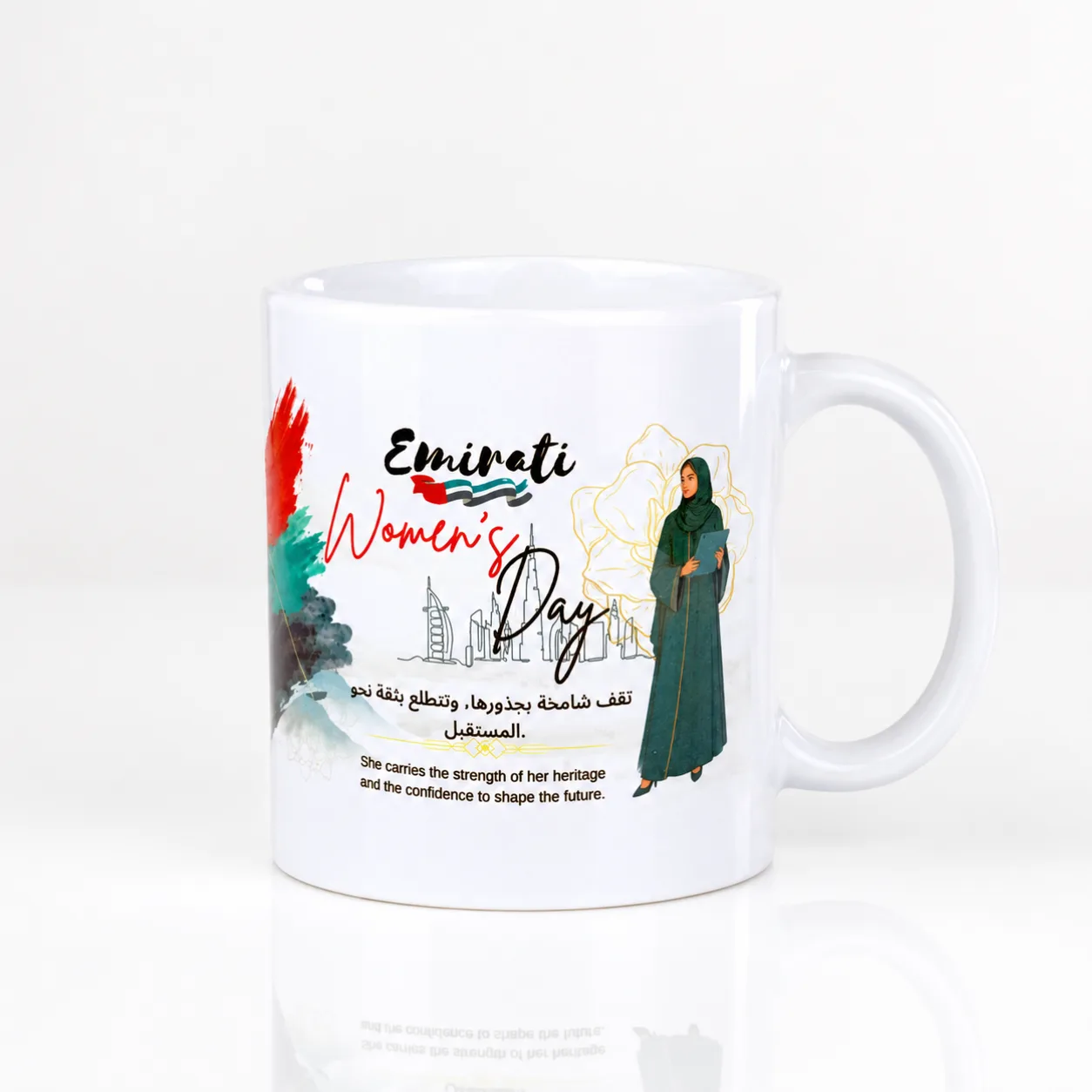 White ceramic Emirati Women’s Day mug featuring a strong women-inspired design