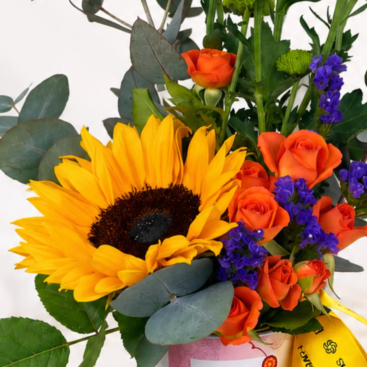 Festive Raksha Bandhan Floral Mug gift with colourful fresh flowers and decorative ribbon