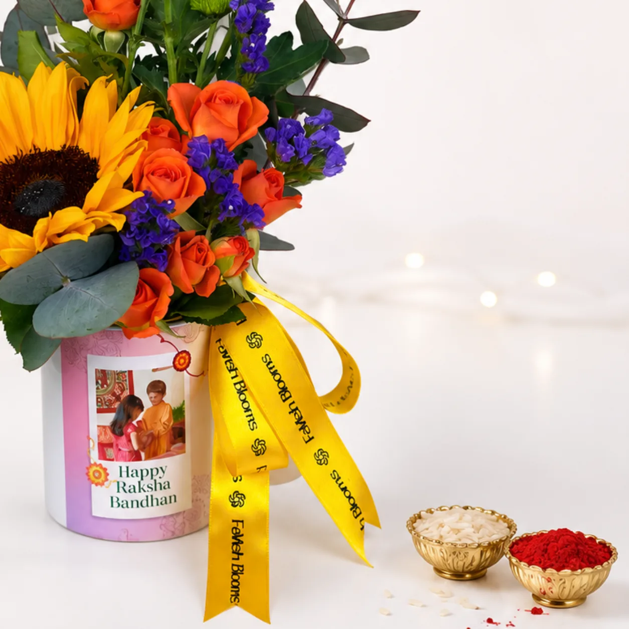 Raksha Bandhan flower mug arrangement for brother with fresh blooms and festive presentation