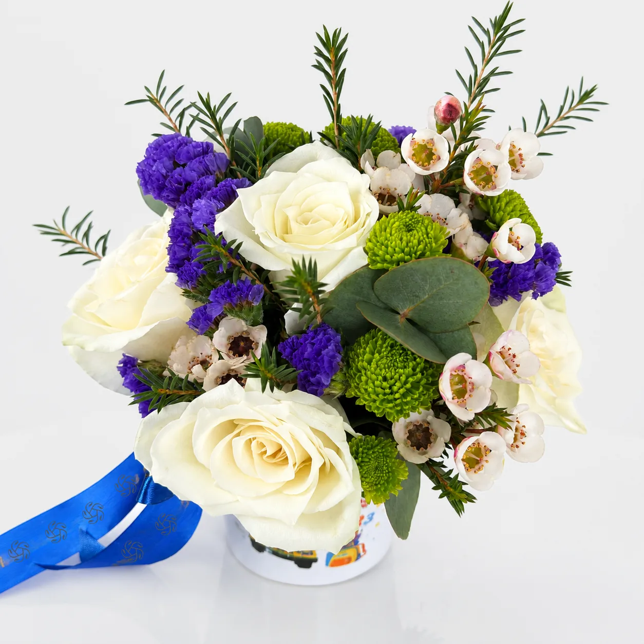 Colorful back to school flower arrangement featuring fresh blooms and decorative greenery