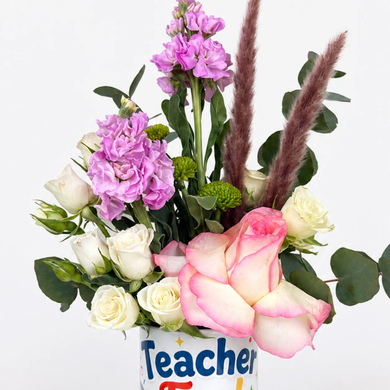 Fresh flower mug arrangement for teachers with cheerful blooms and meaningful appreciation design
