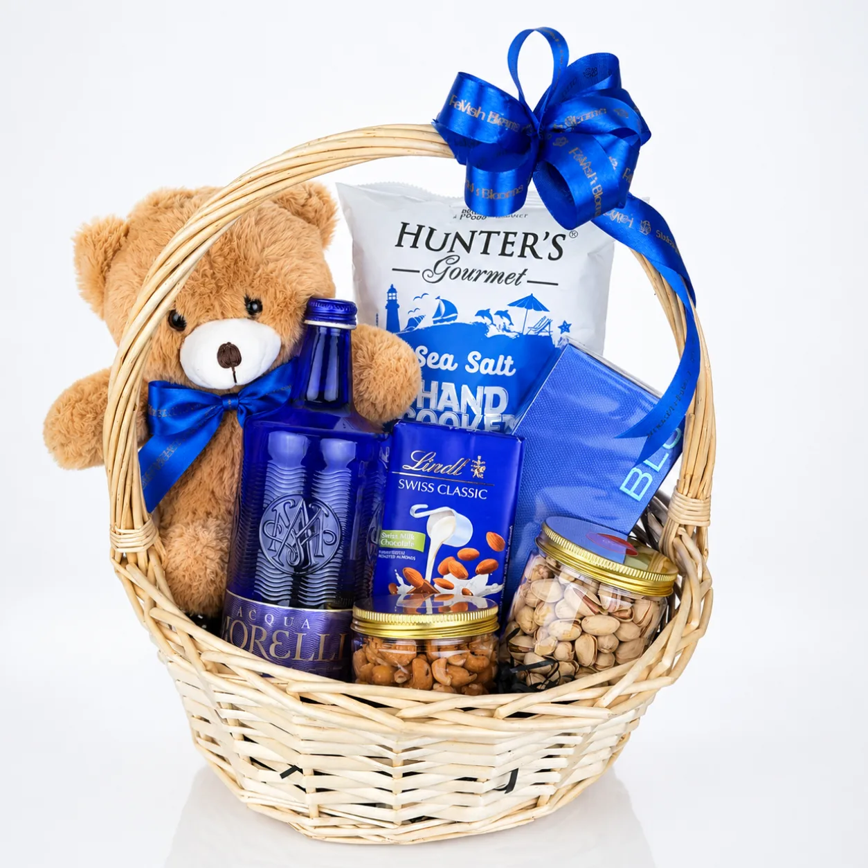 Luxury Blu Perfume gift basket featuring chocolates, snacks and elegant gift presentation