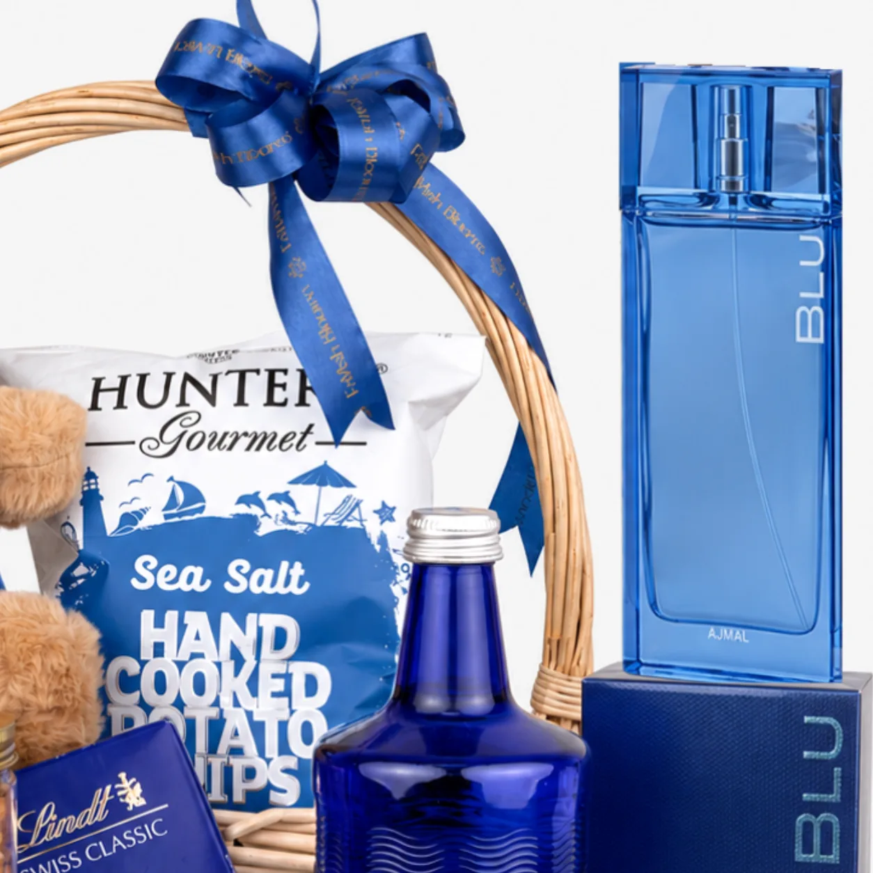Premium perfume and gourmet gift basket for birthdays, anniversaries and special celebrations