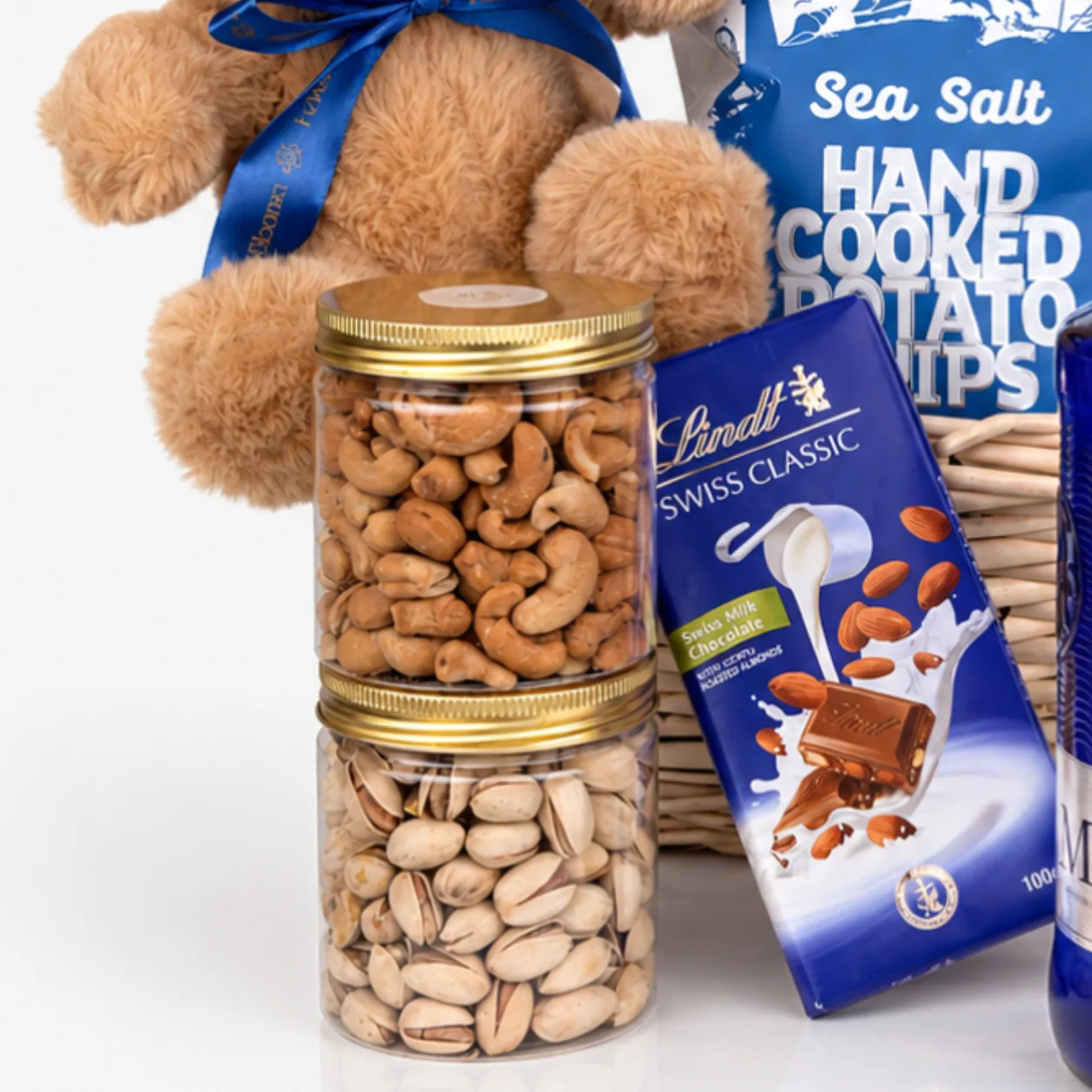 Blu Perfume Gift Hamper with assorted treats, stylish fragrance and premium basket presentation