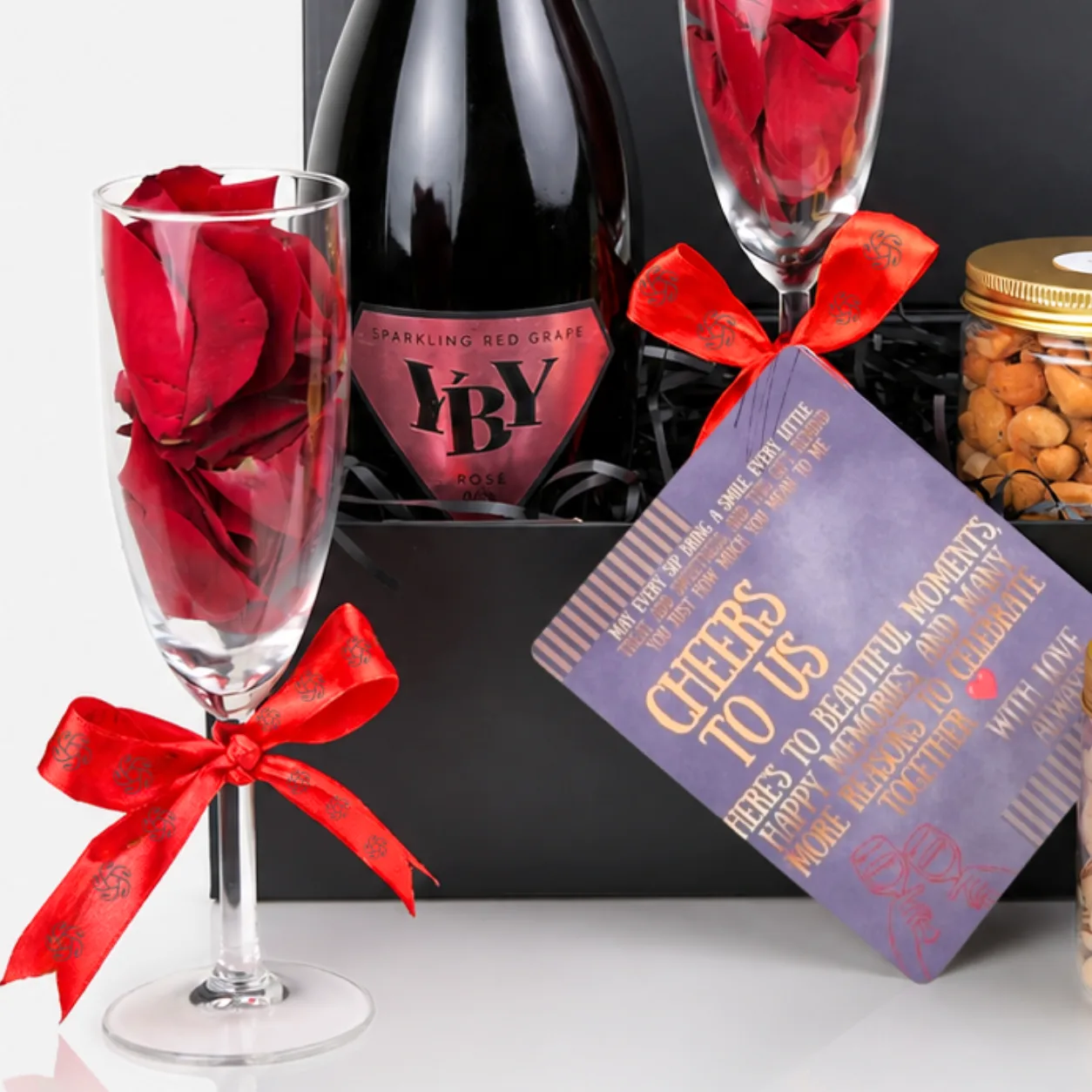 Elegant Sparkling Rosé & Premium Nuts Gift Box with non-alcoholic bubbly, premium nuts and refined celebration presentation