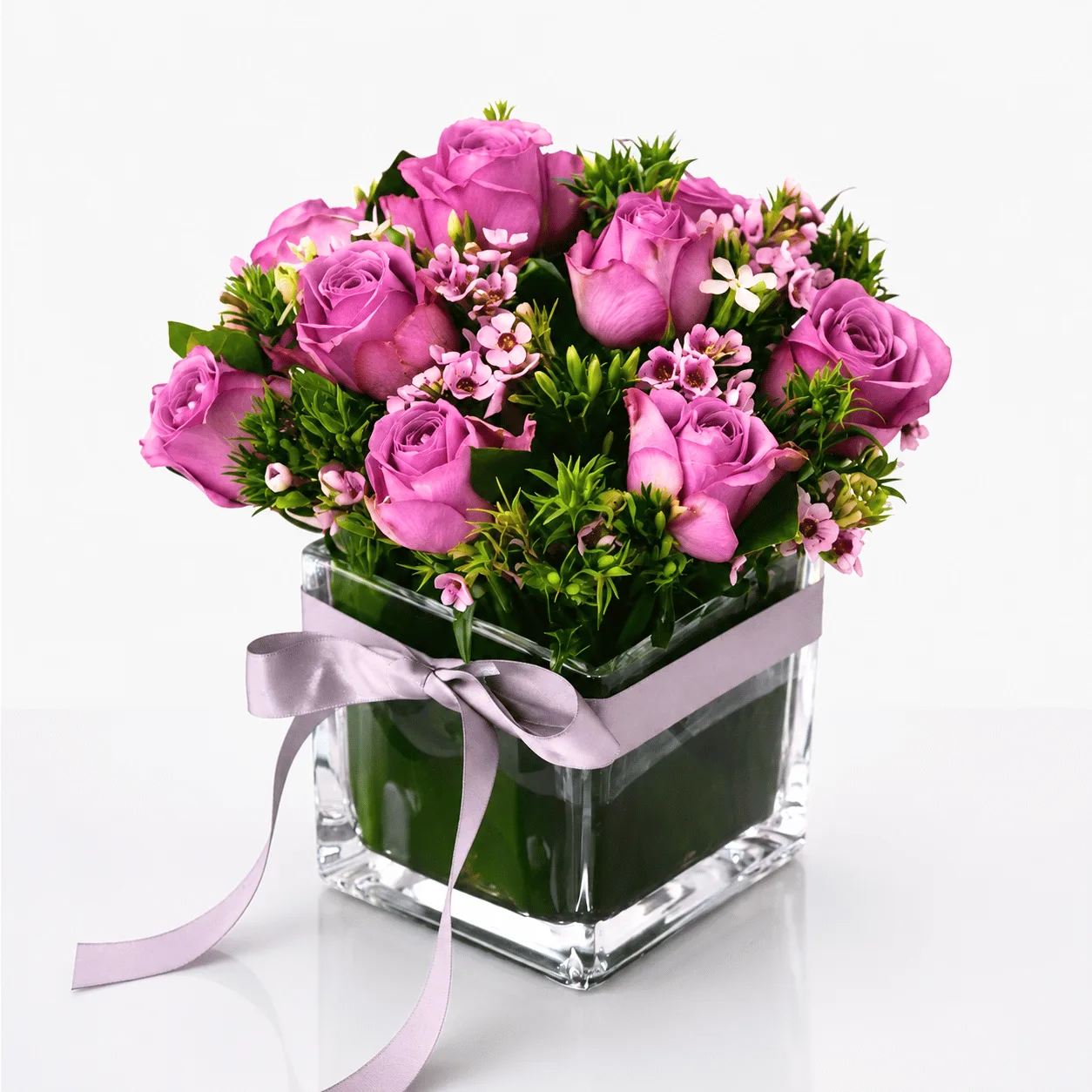 Tender Violet Rose Vase with premium purple roses and delicate purple wax flowers
