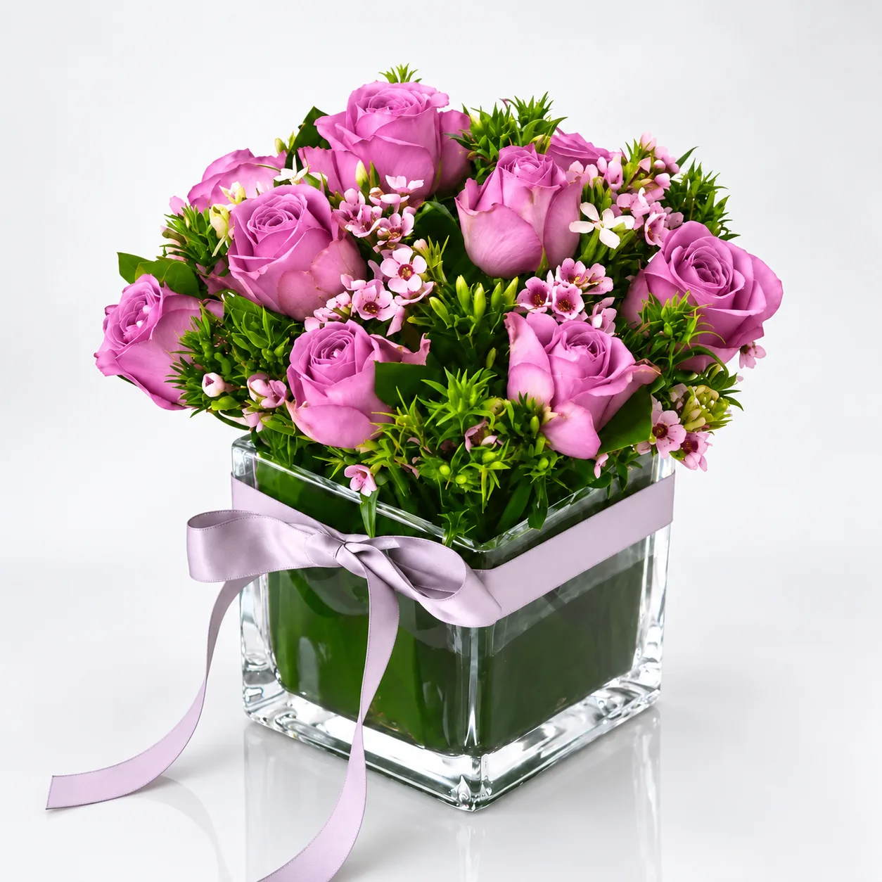 Tender Violet Rose Vase Gift Arrangement in Dubai