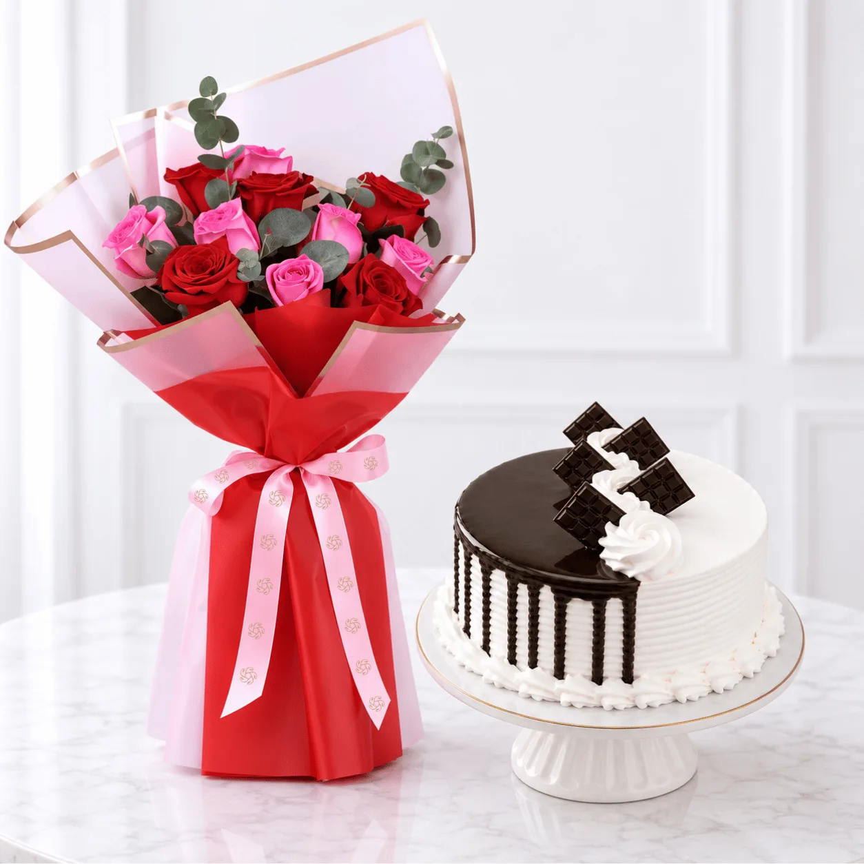 11 Red & Pink Roses with Choco Vanilla Cake 500 g in Dubai