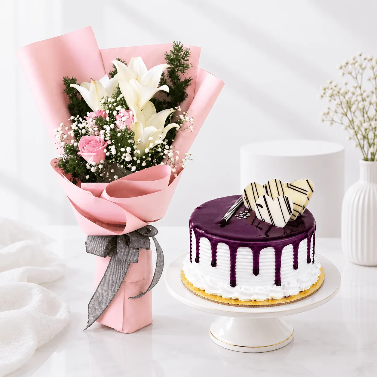 Lily & Rose Bouquet with Blueberry Vanilla Cake 500 g in Dubai