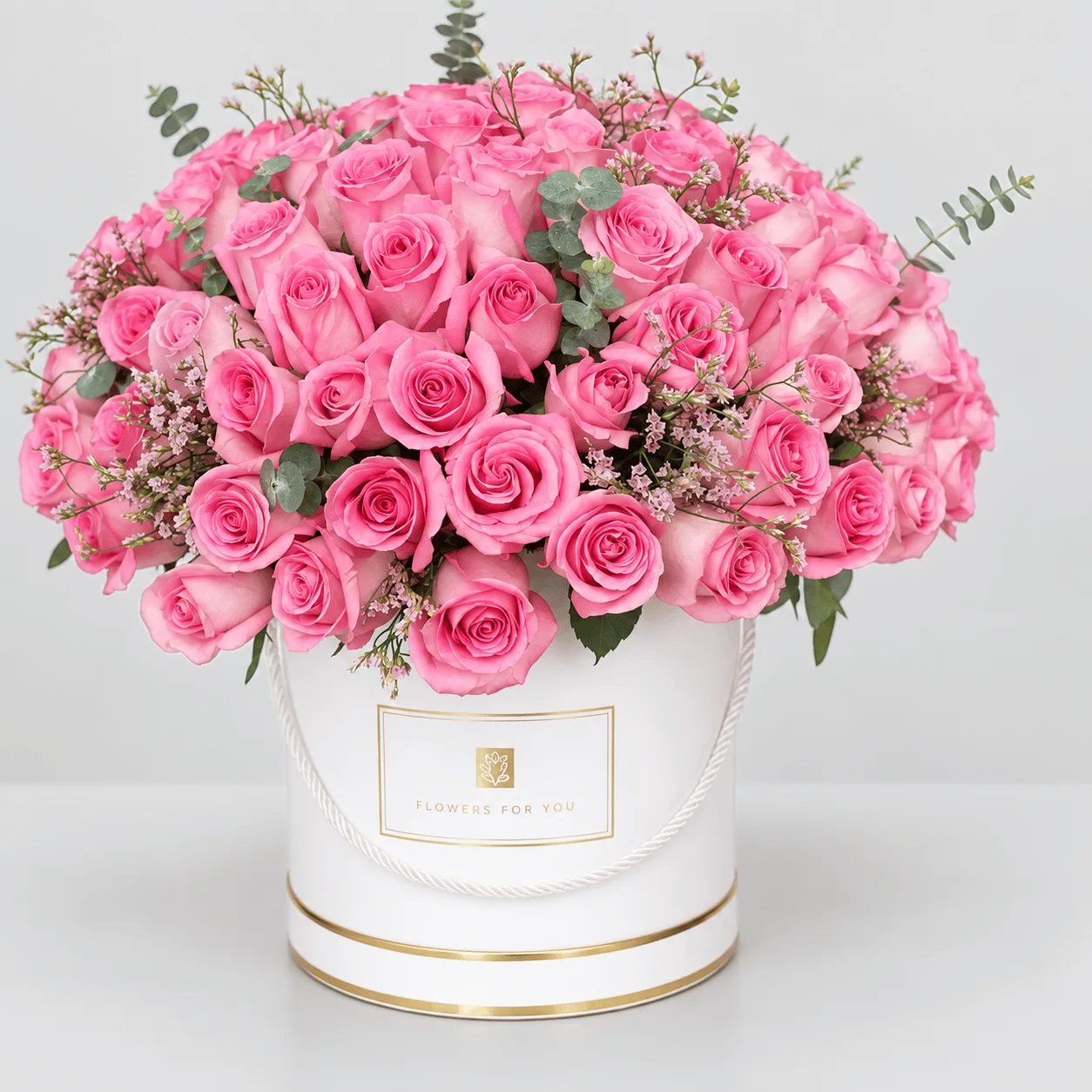 Luxury 101 pink roses beautifully arranged in a premium white round box.