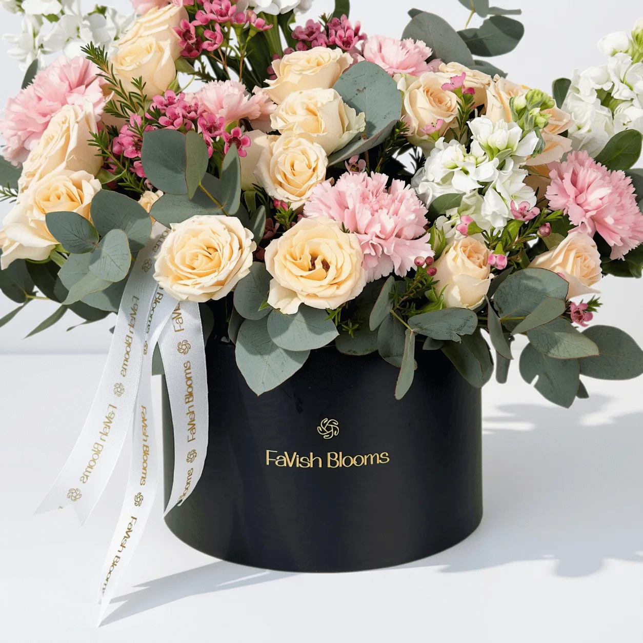 Luxury pink and peach flower box for birthdays, anniversaries and special occasions.