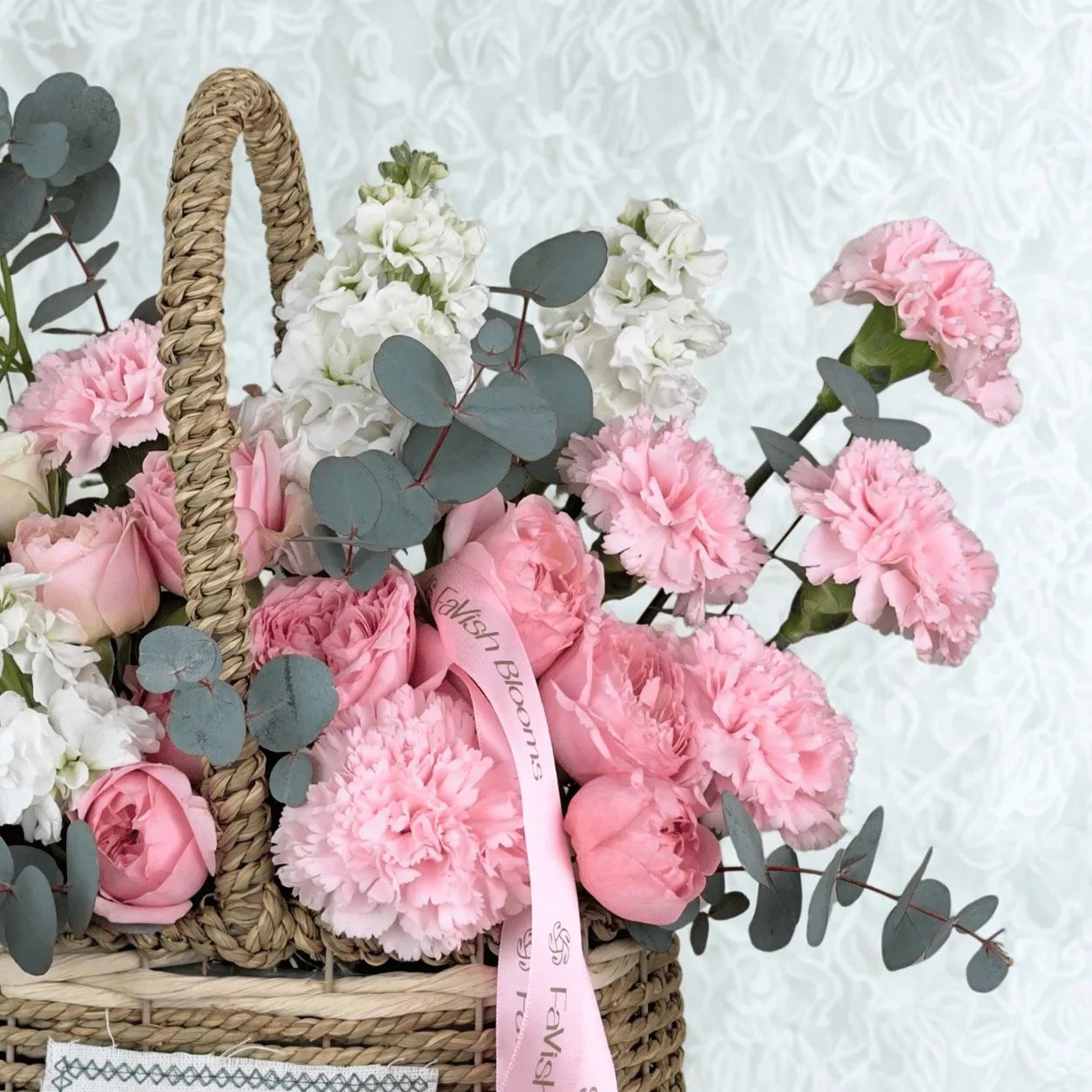 Elegant Juliette rose and matthiola basket arrangement for romantic surprises in Dubai.