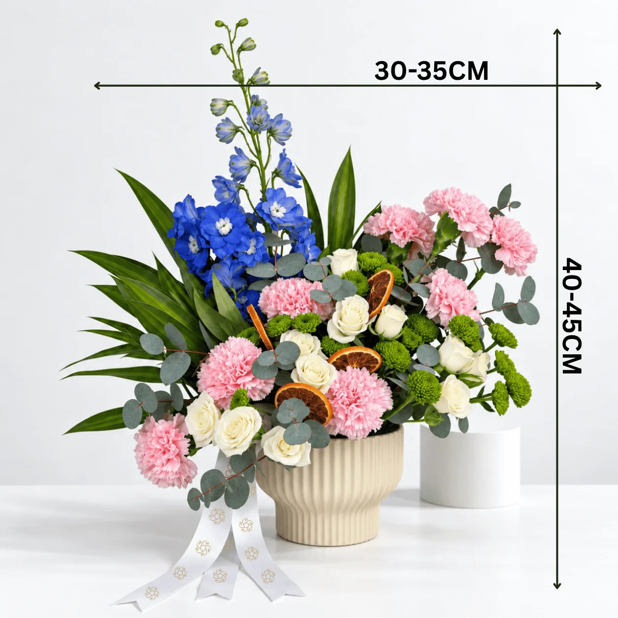 Whispers of Spring floral arrangement with fresh greenery for get-well-soon and thinking-of-you gifts.