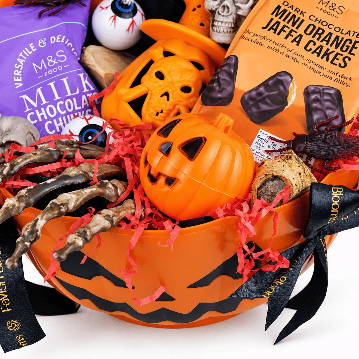 Close-up of Spooky Witch Halloween Chocolate Gift Hamper featuring assorted chocolates and spooky witch-themed decorations.