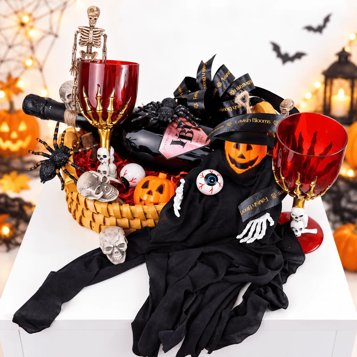 Close-up of Haunted Halloween Sparkling Rosé Gift Basket highlighting sparkling rosé and decorative Halloween accents.
