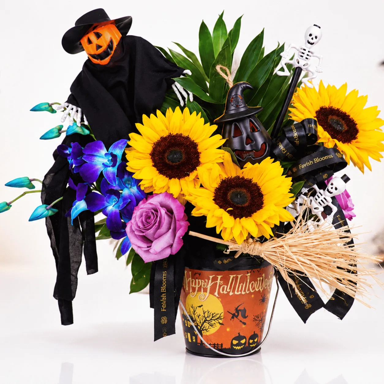 Close-up of Spooky Pumpkin Halloween Flower Arrangement highlighting fresh flowers, rich autumn colours, and spooky details.