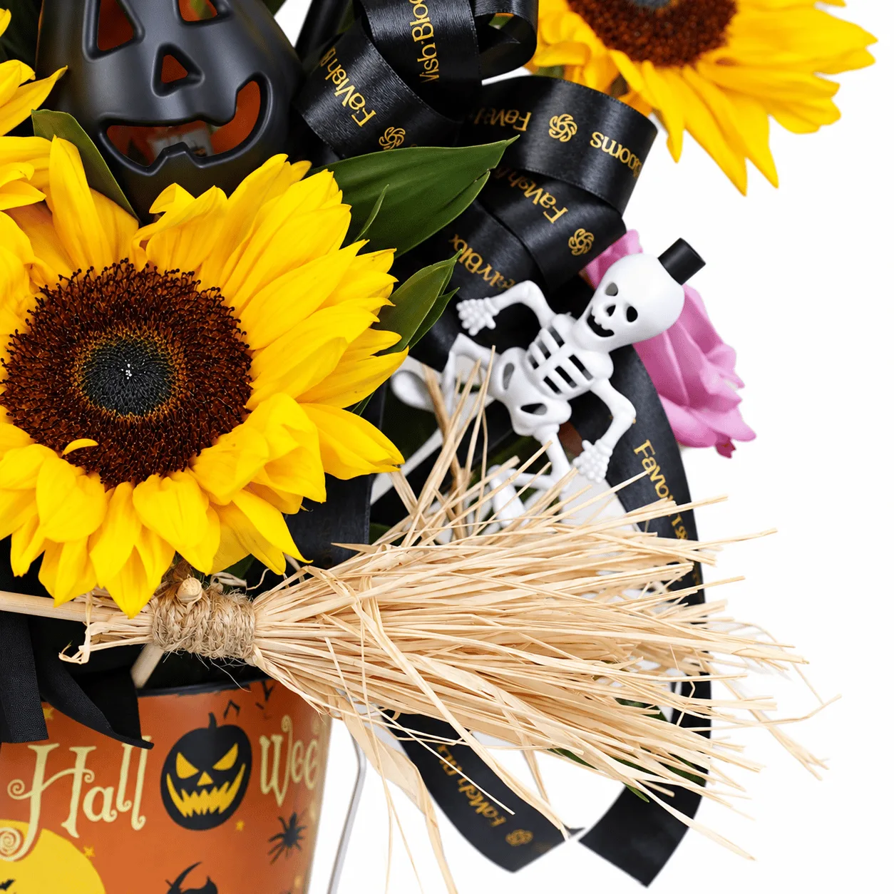 Spooky Pumpkin Halloween Flower Arrangement, a festive floral centrepiece perfect for Halloween gifting and home decoration.
