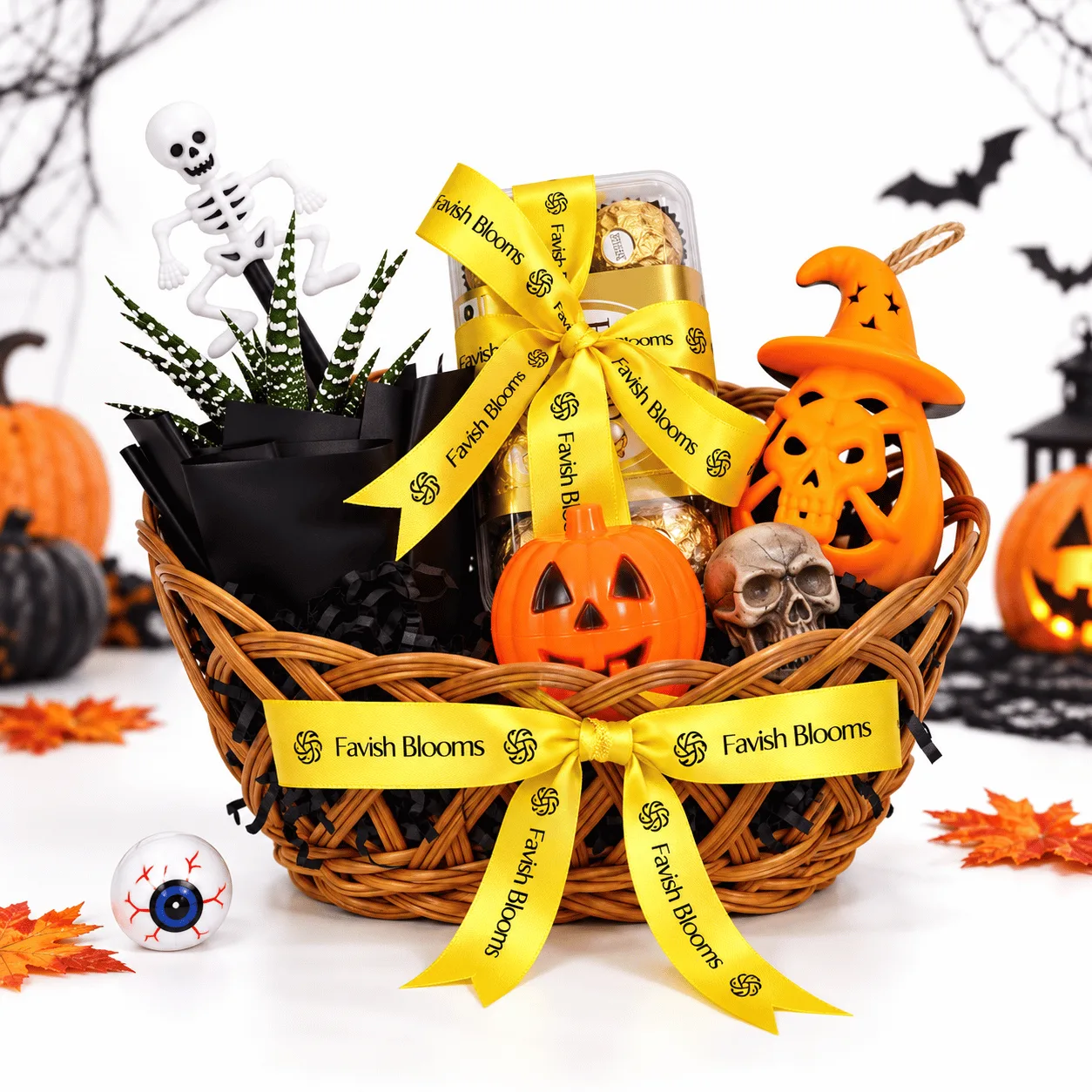 Spooky Halloween Chocolate & Pumpkin Gift Basket featuring festive chocolates and pumpkin-themed decorations.