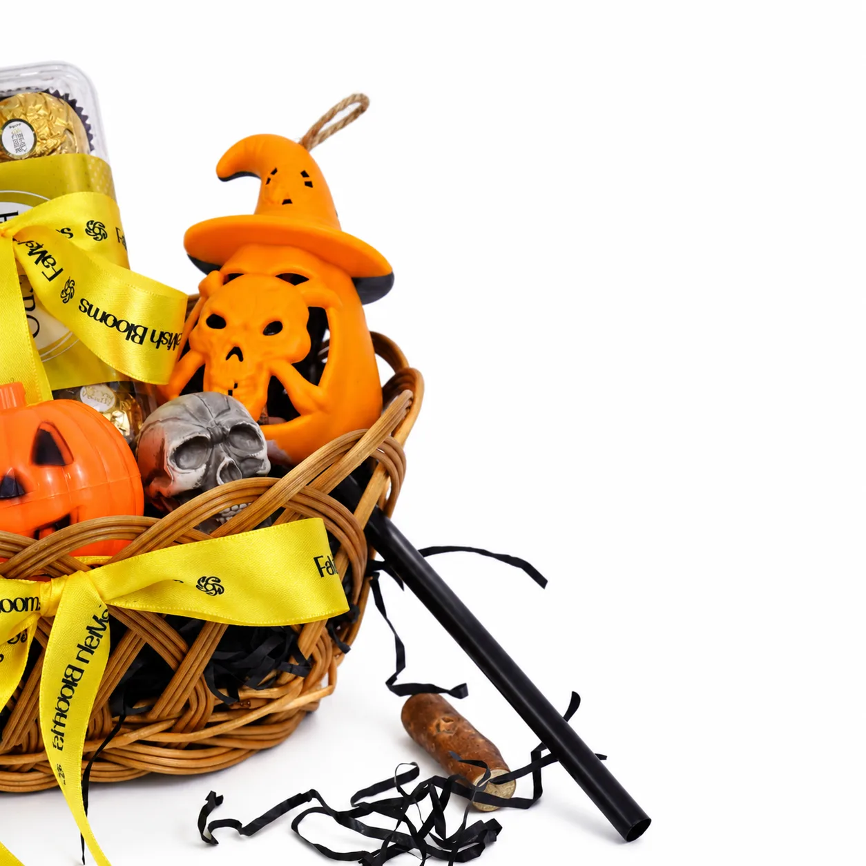 Close-up of Spooky Halloween Chocolate & Pumpkin Gift Basket showcasing chocolate treats and Halloween pumpkin details.