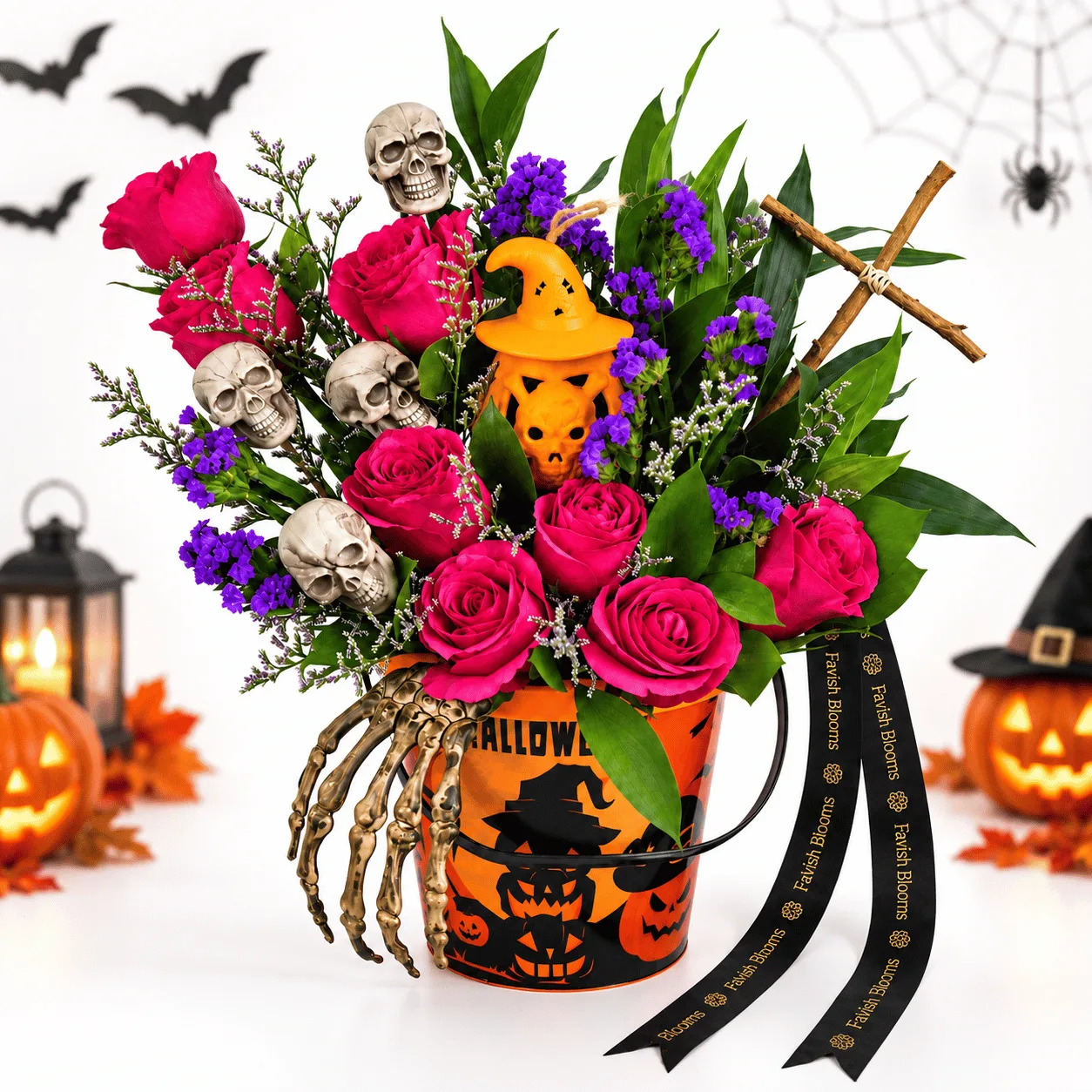 Haunted Halloween Pink Roses & Skeleton Flower Bucket featuring beautiful pink roses and spooky skeleton decorations.