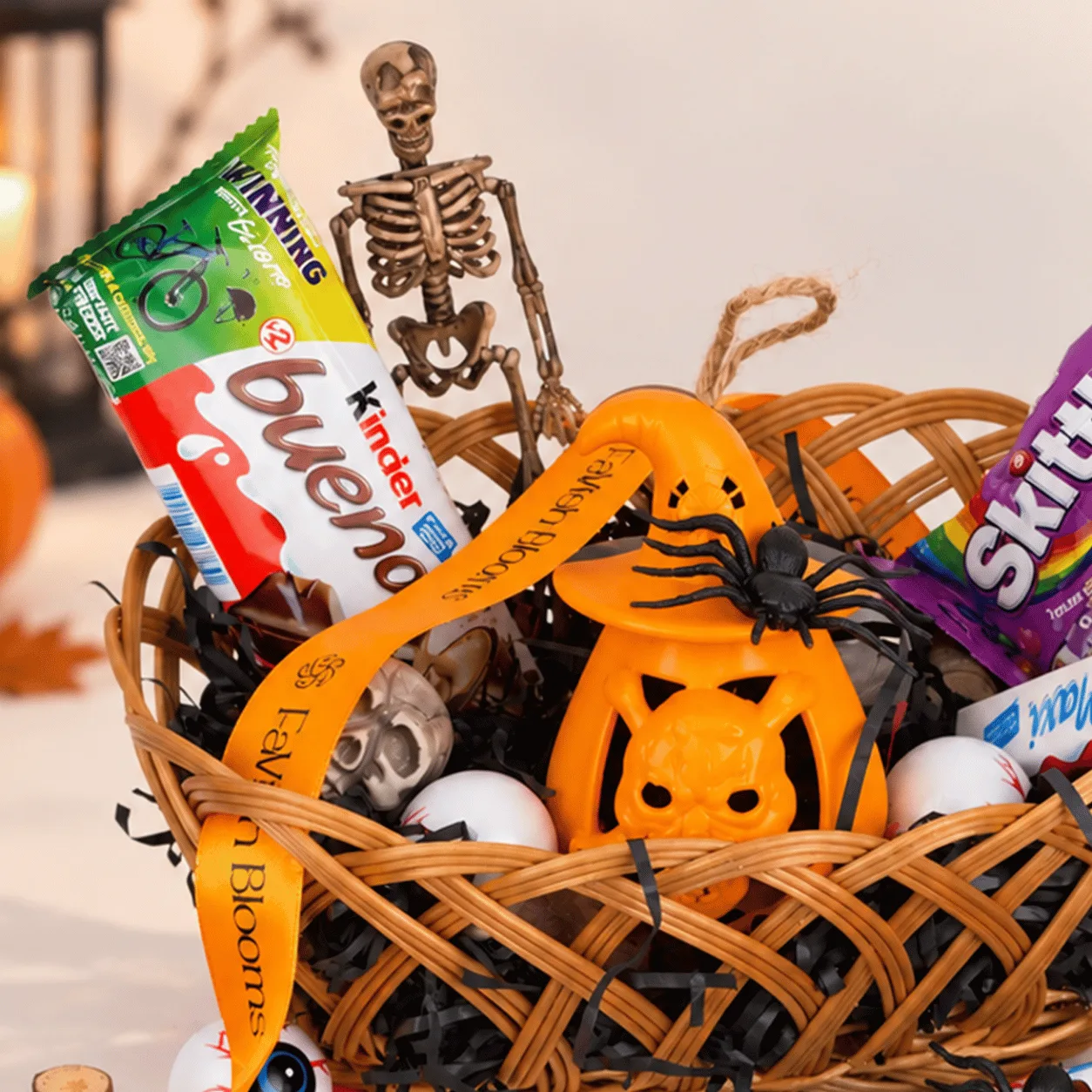 Close-up of Halloween Magic Chocolate Treat Hamper showcasing a delightful selection of chocolates and festive Halloween goodies.