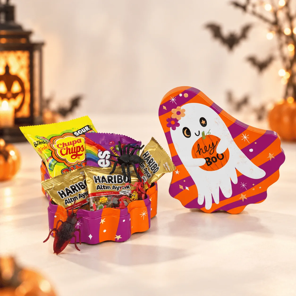 Close-up of Hey Boo Halloween Candy Surprise Gift Box showcasing delicious sweets and festive Halloween details.