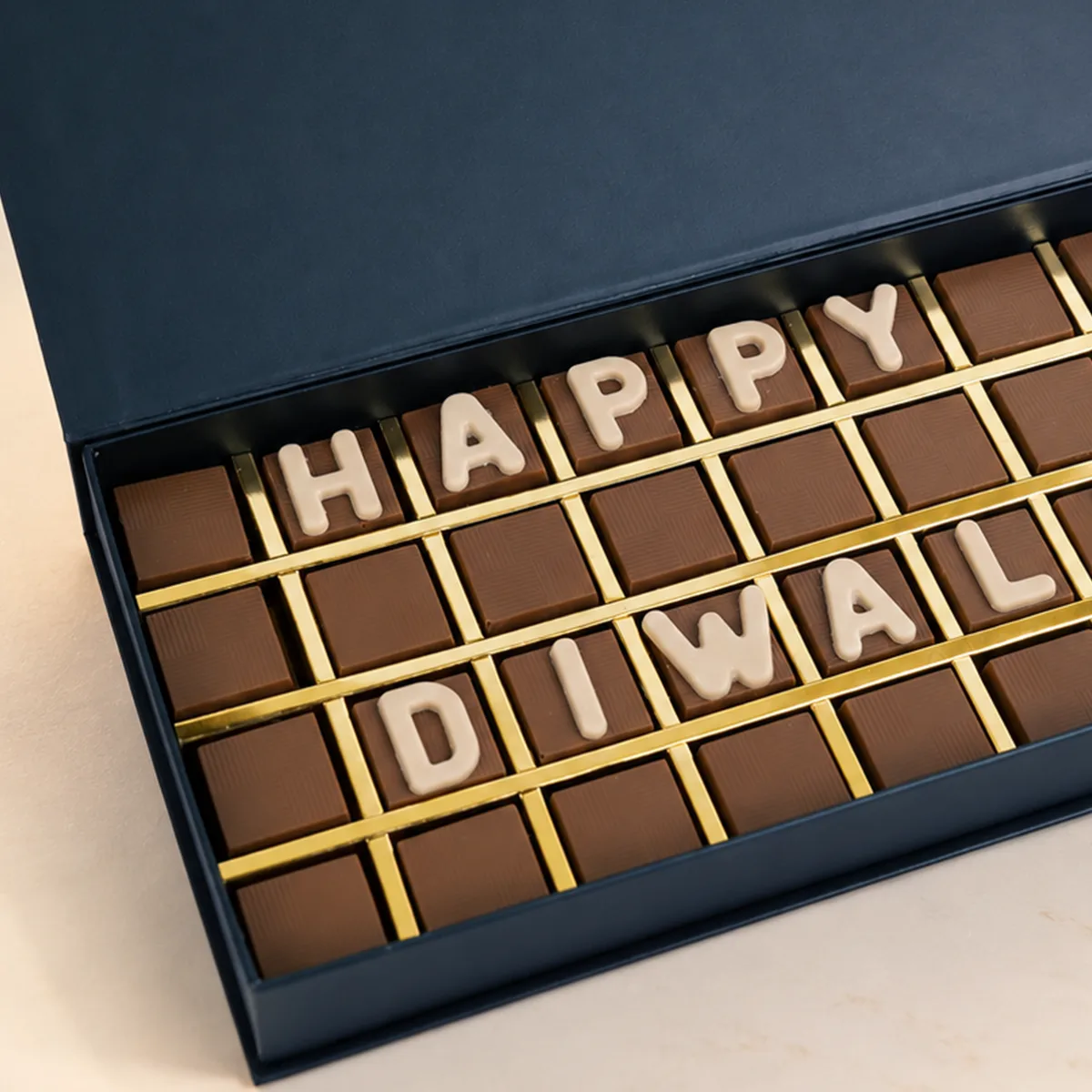 Elegant Happy Diwali Premium 32 Pc Chocolate Gift Box showcasing its festive packaging and chocolate selection.