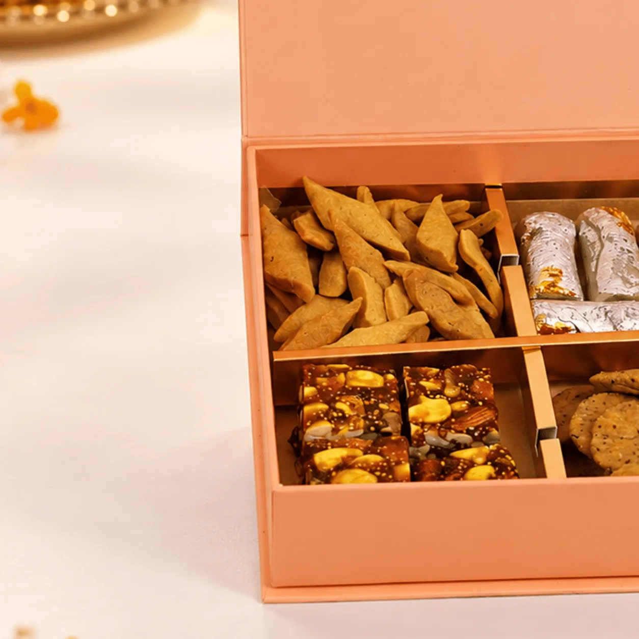 Beautifully presented Diwali Sweets & Savoury Gift Box with elegant festive packaging for Diwali gifting in Dubai.