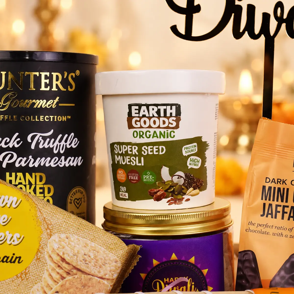 Close-up of Diwali gourmet hamper featuring organic super seed muesli and premium festive treats.