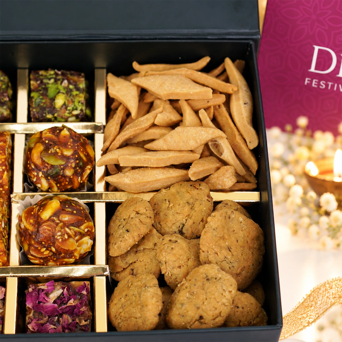 Diwali gourmet gift box featuring crispy namak para, mathri, and traditional Indian sweets.