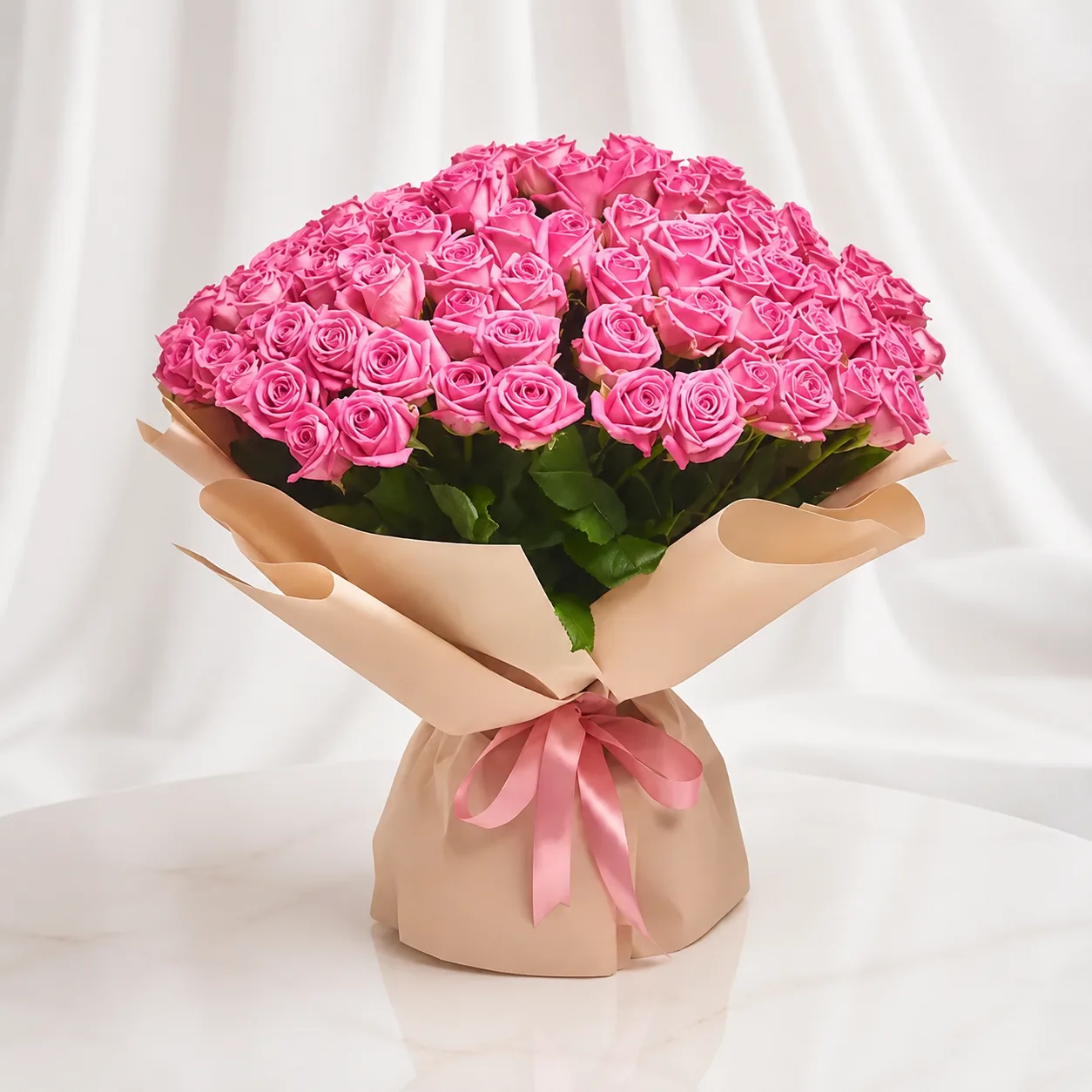 Fresh pink roses bouquet wrapped in elegant pastel paper with premium finishing and soft ribbon, perfect for romantic gifting, birthdays, and same-day flower delivery in Dubai.