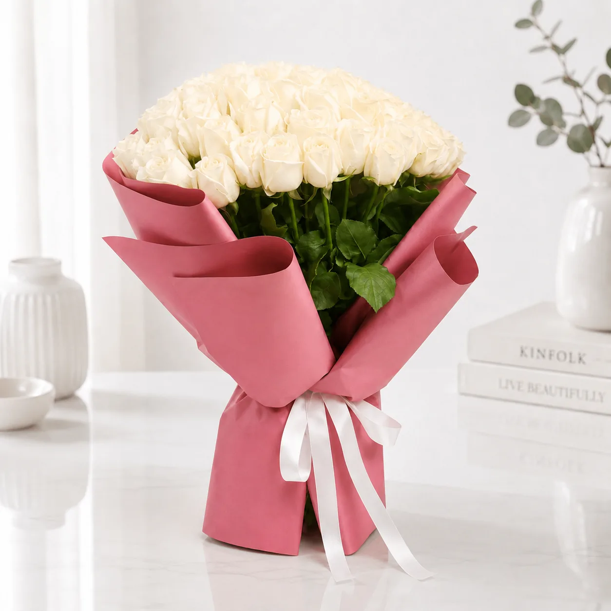 51 White O Hara roses bouquet arranged in luxury floral wrap by FaVish Blooms