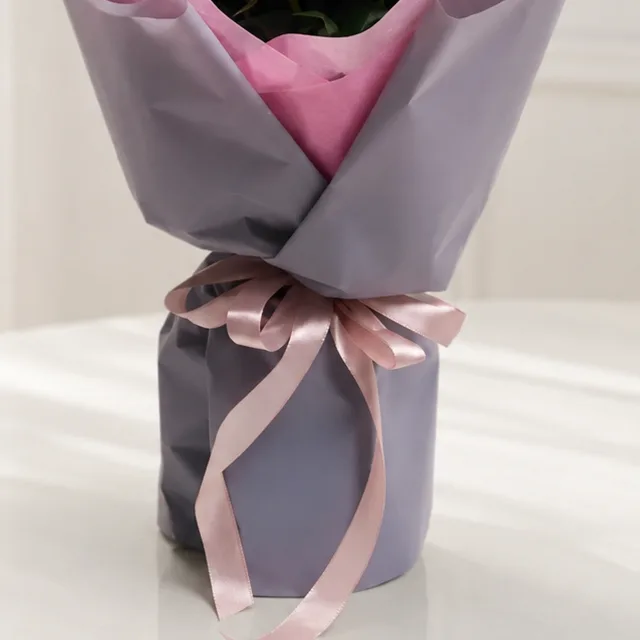 Elegant 25 Red Rose Rhodos Bouquet wrapped beautifully for anniversaries, birthdays, and love occasions.