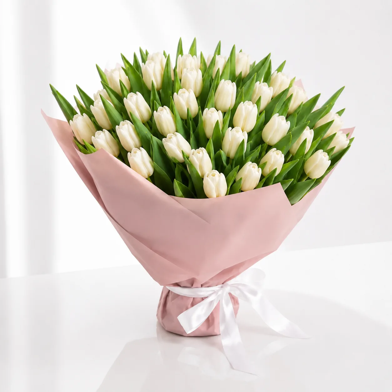 75 White Tulips Bouquet elegantly arranged in luxury wrapping
